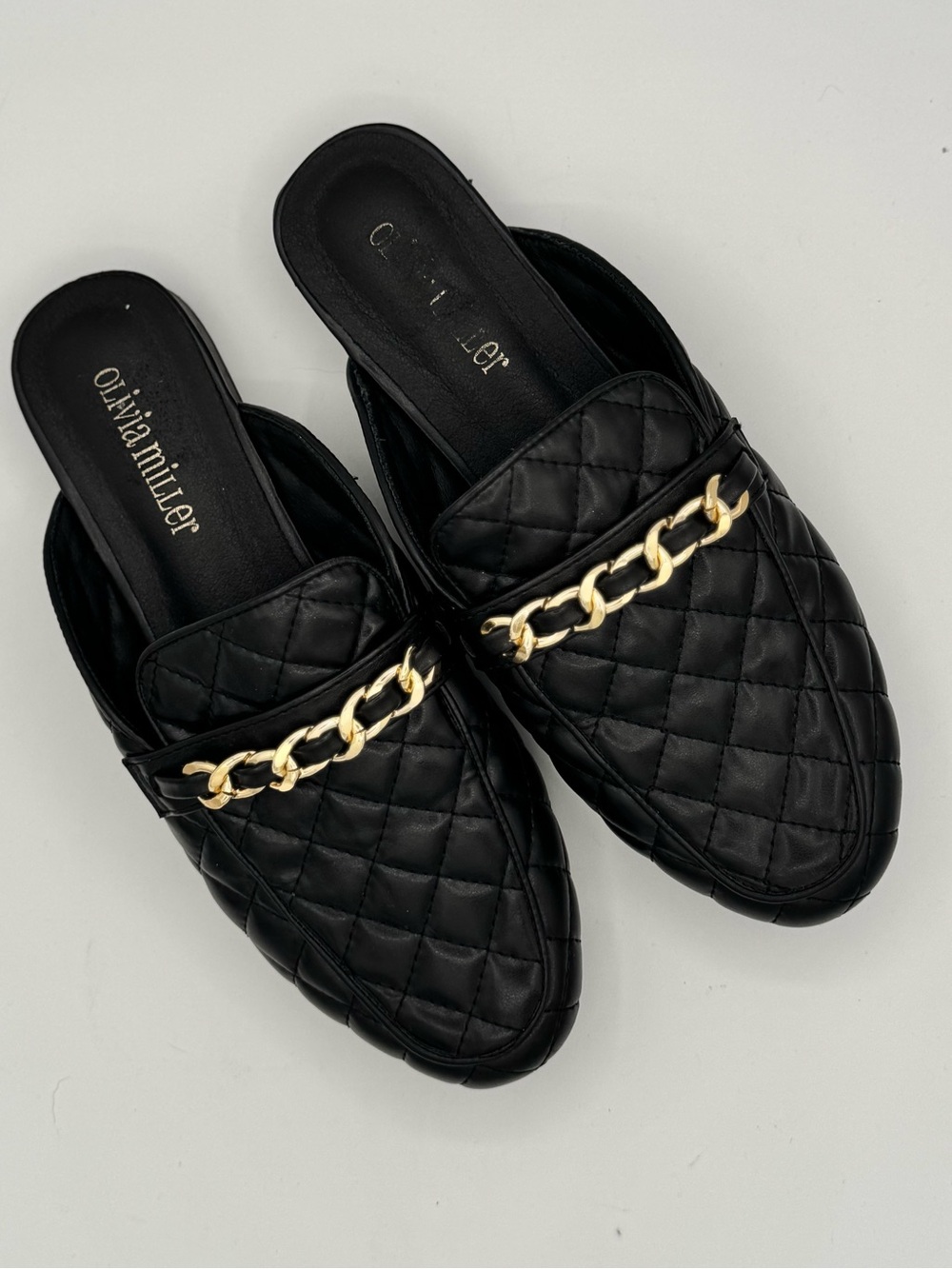 Olivia Miller Black Quilted Slip-On Mules with Gold Chain Accent